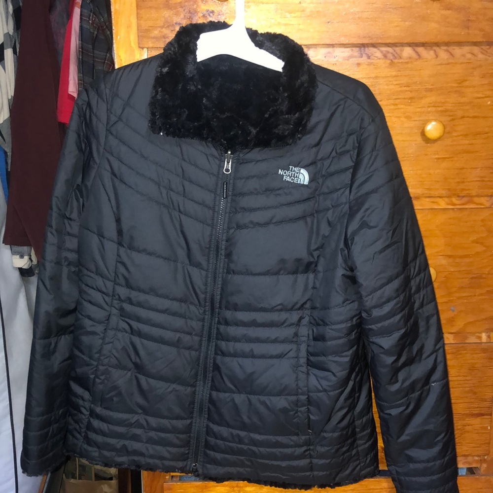 Black North face, size large... super fuzzy fleece lined inside.